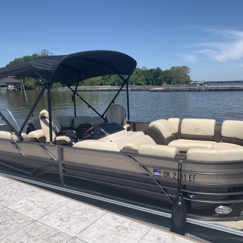 a row of beach chairs and an umbrella