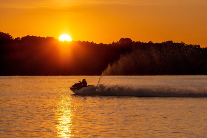a small boat in a large body of water