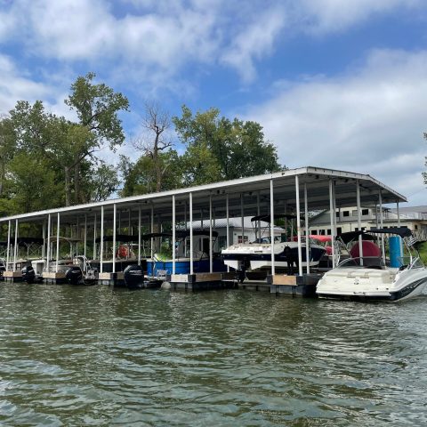 a group of people on a boat in the water