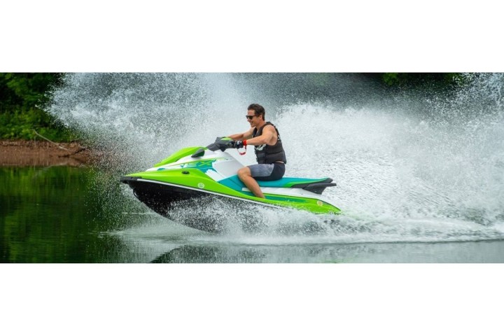 a man riding a wave on a surfboard in the water